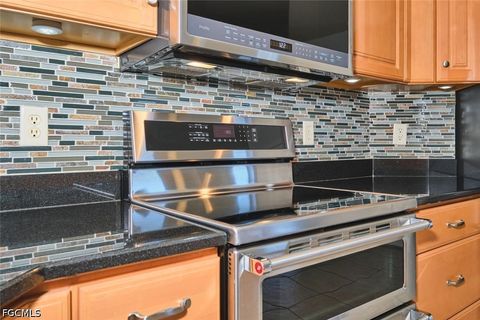 Tiny photo for 844 NE 6th Avenue, Cape Coral, FL 33909 (MLS # 2026020072)