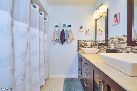 Tiny photo for 844 NE 6th Avenue, Cape Coral, FL 33909 (MLS # 2026020072)