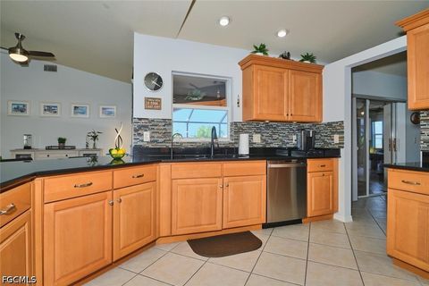 Tiny photo for 844 NE 6th Avenue, Cape Coral, FL 33909 (MLS # 2026020072)