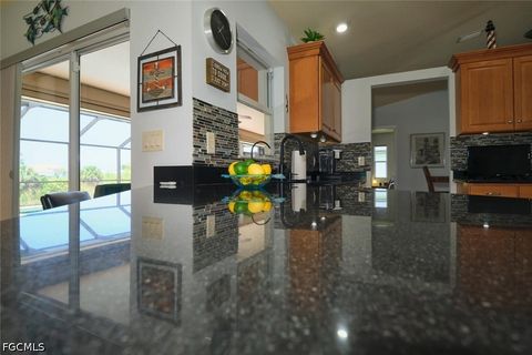 Tiny photo for 844 NE 6th Avenue, Cape Coral, FL 33909 (MLS # 2026020072)