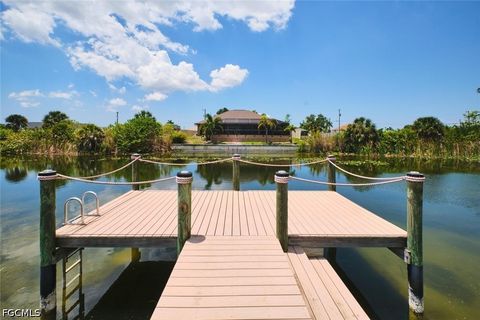 Tiny photo for 844 NE 6th Avenue, Cape Coral, FL 33909 (MLS # 2026020072)