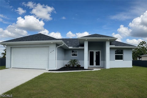 Photo of 475 Lenox Avenue, Lehigh Acres, FL 33974 (MLS # 2026039984)