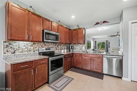 Photo of 2132 Pigeon Plum Way, North Fort Myers, FL 33917 (MLS # 2026020116)