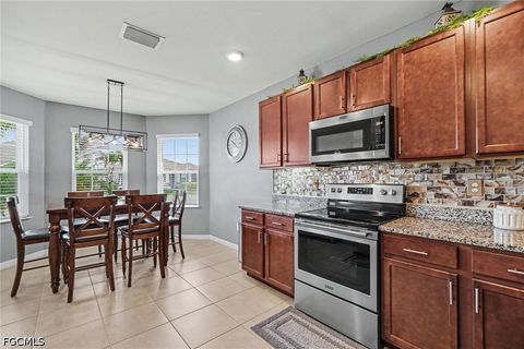 Tiny photo for 2132 Pigeon Plum Way, North Fort Myers, FL 33917 (MLS # 2026020116)