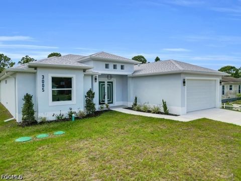 Photo of 3005 52nd Street W, Lehigh Acres, FL 33971 (MLS # 2026020414)