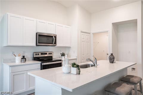 Tiny photo for 340 NE 21st Street, Cape Coral, FL 33909 (MLS # 2026028509)