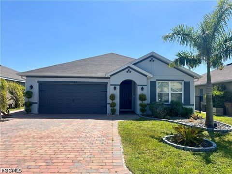 Photo of 10293 Silver Pond Lane, Lehigh Acres, FL 33936 (MLS # 2026020346)
