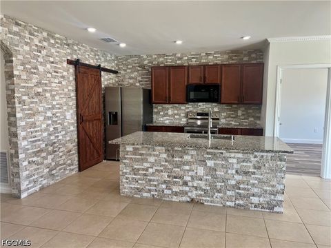 Tiny photo for 10293 Silver Pond Lane, Lehigh Acres, FL 33936 (MLS # 2026020346)