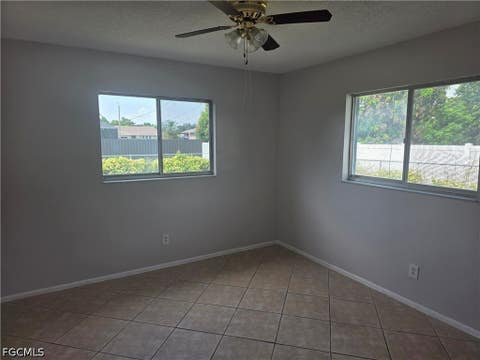 Tiny photo for 1542 Canal Street, Lehigh Acres, FL 33936 (MLS # 2026031100)