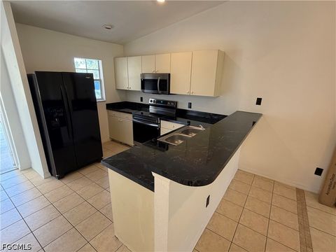 Tiny photo for 803 Meadow Road, Lehigh Acres, FL 33973 (MLS # 2026020114)