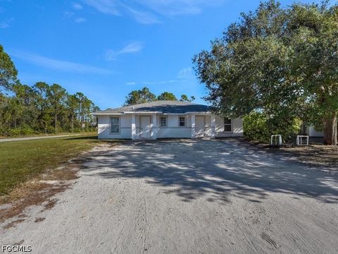 Photo of 803 Meadow Road, Lehigh Acres, FL 33973 (MLS # 2026020114)
