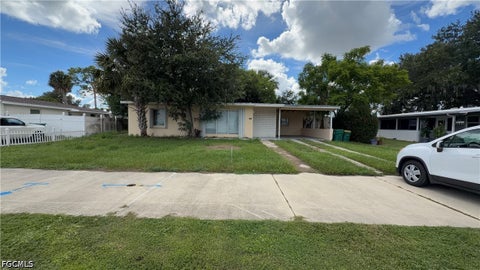 Photo of 2305 Elkcam Boulevard, Port Charlotte, FL 33952 (MLS # 2026039320)