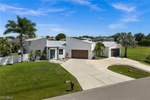 Photo of 1007 NW 16th Place, Cape Coral, FL 33993 (MLS # 2026038994)