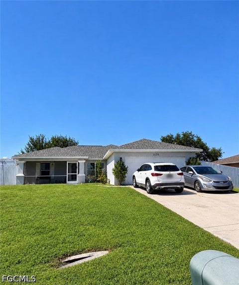 Photo of 1039 Albert Avenue, Lehigh Acres, FL 33971 (MLS # 2026043132)