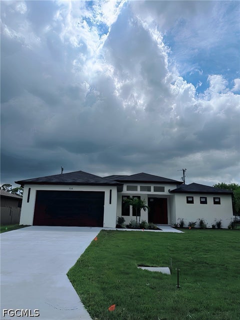 Photo of 714 SW 4th Street, Cape Coral, FL 33991 (MLS # 2026042387)