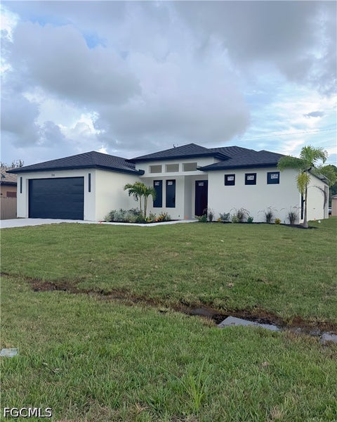 Photo of 714 SW 4th Street, Cape Coral, FL 33991 (MLS # 2026042387)