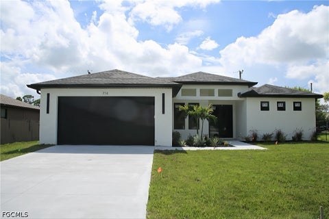 Photo of 714 SW 4th Street, Cape Coral, FL 33991 (MLS # 2026042387)