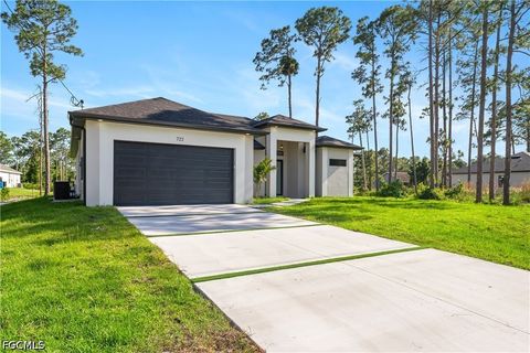 Photo of 722 Phelps Street E, Lehigh Acres, FL 33974 (MLS # 2026020183)