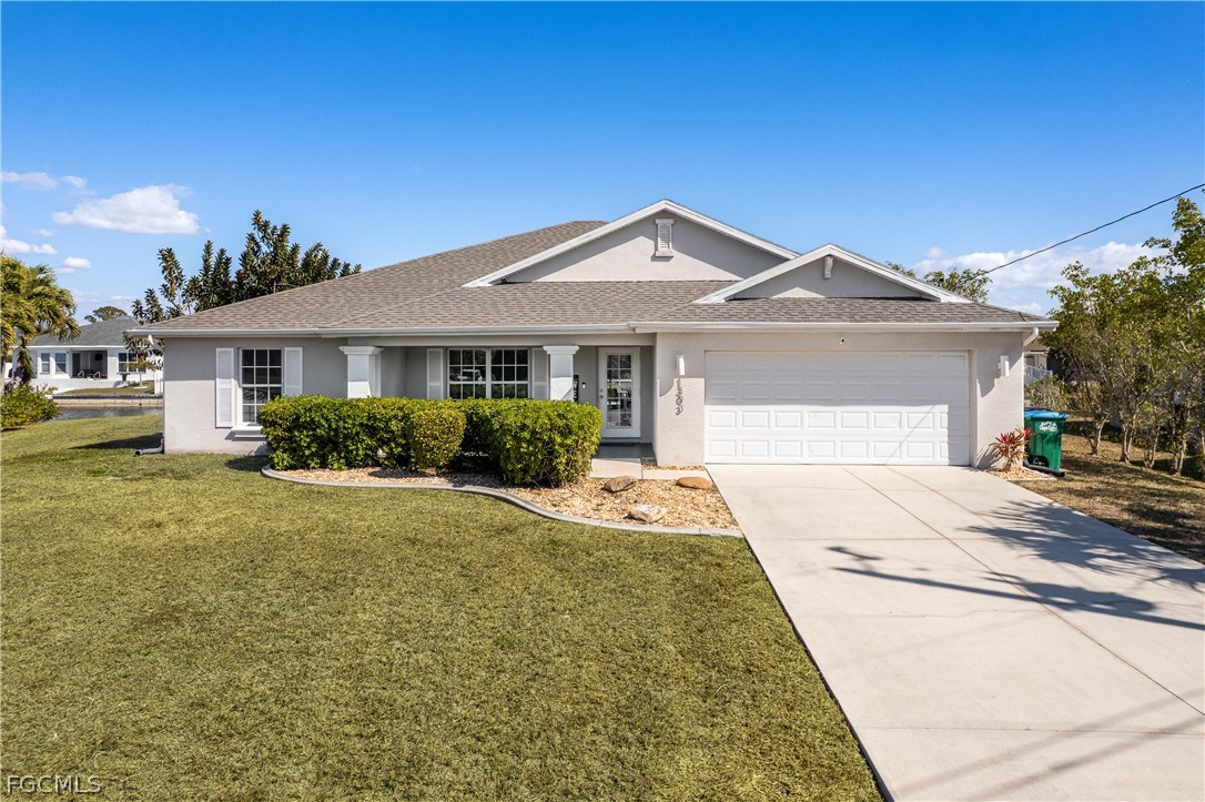 Photo 1 of 35 — 1303 SW 8th Court, Cape Coral, FL 33991