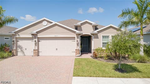 Photo of 18217 Everson Miles Circle, North Fort Myers, FL 33917 (MLS # 2026035198)