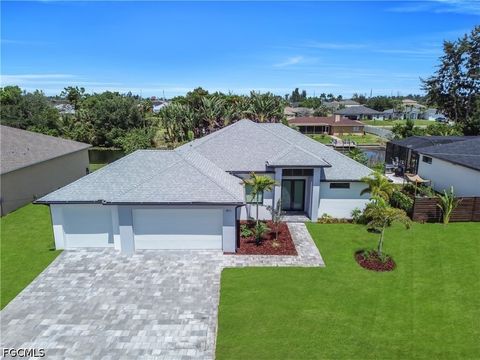 Photo of 411 SW 26th Place, Cape Coral, FL 33991 (MLS # 2026022438)