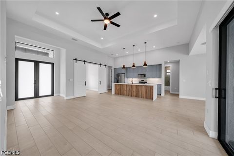 Tiny photo for 411 SW 26th Place, Cape Coral, FL 33991 (MLS # 2026022438)