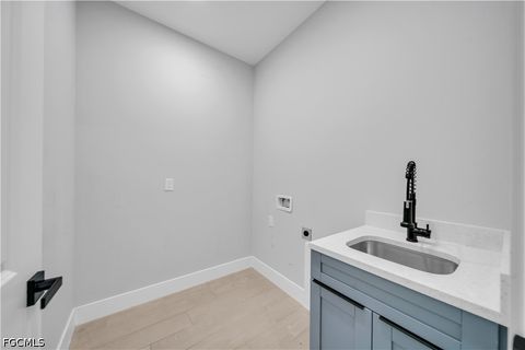Tiny photo for 411 SW 26th Place, Cape Coral, FL 33991 (MLS # 2026022438)