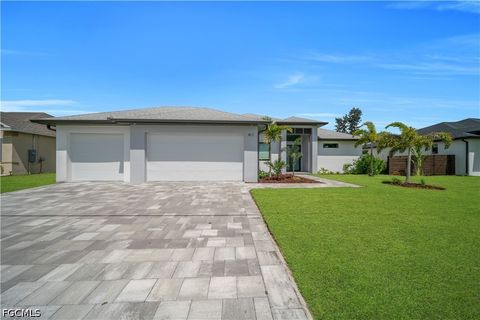 Tiny photo for 411 SW 26th Place, Cape Coral, FL 33991 (MLS # 2026022438)