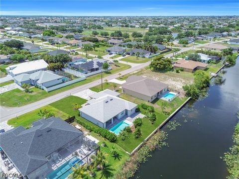 Tiny photo for 411 SW 26th Place, Cape Coral, FL 33991 (MLS # 2026022438)