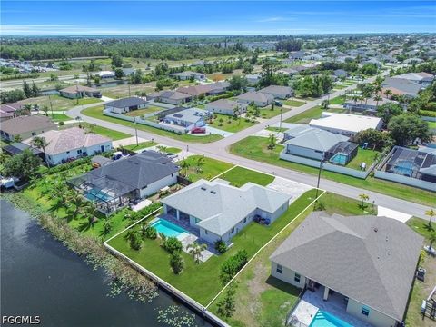 Tiny photo for 411 SW 26th Place, Cape Coral, FL 33991 (MLS # 2026022438)
