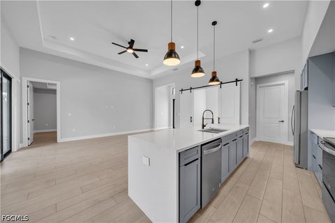 Tiny photo for 411 SW 26th Place, Cape Coral, FL 33991 (MLS # 2026022438)
