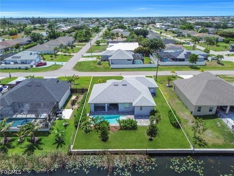 Tiny photo for 411 SW 26th Place, Cape Coral, FL 33991 (MLS # 2026022438)
