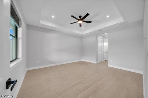 Tiny photo for 411 SW 26th Place, Cape Coral, FL 33991 (MLS # 2026022438)
