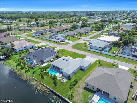 Tiny photo for 411 SW 26th Place, Cape Coral, FL 33991 (MLS # 2026022438)