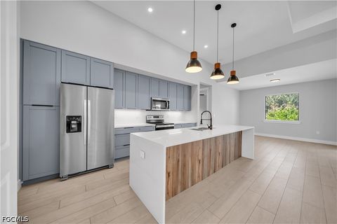 Tiny photo for 411 SW 26th Place, Cape Coral, FL 33991 (MLS # 2026022438)