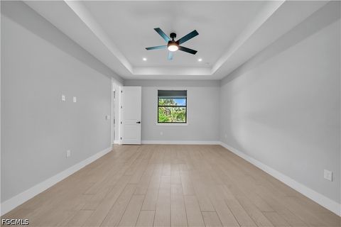 Tiny photo for 411 SW 26th Place, Cape Coral, FL 33991 (MLS # 2026022438)