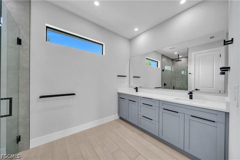 Tiny photo for 411 SW 26th Place, Cape Coral, FL 33991 (MLS # 2026022438)