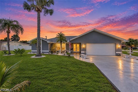 Photo of 514 SE 34th Terrace, Cape Coral, FL 33904 (MLS # 2026039034)