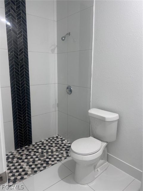 Tiny photo for 970 Lakeside Drive, Lehigh Acres, FL 33974 (MLS # 2026010557)