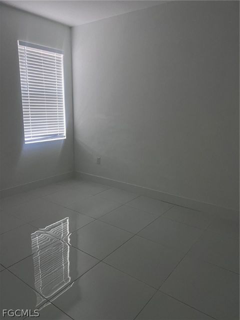 Tiny photo for 970 Lakeside Drive, Lehigh Acres, FL 33974 (MLS # 2026010557)