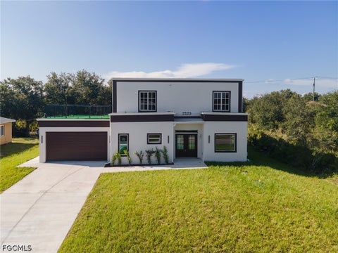 Photo of 2523 69th Street W, Lehigh Acres, FL 33971 (MLS # 2026037718)