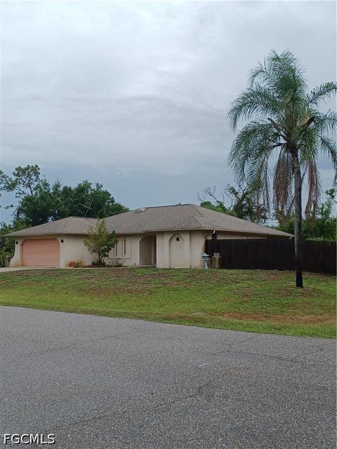 Photo of 5230 Montego Lane, Port Charlotte, FL 33981 (MLS # 2026025310)