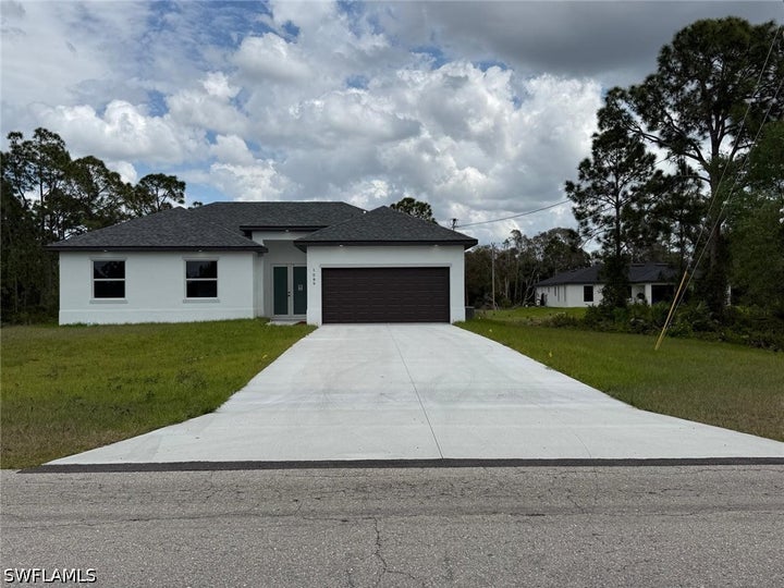 Photo 1 of 22 — 1089 Eisenhower Boulevard, Lehigh Acres, FL 33974