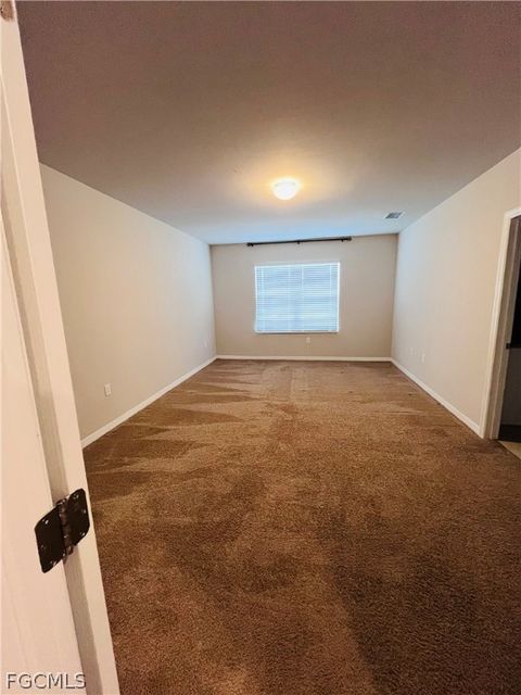 Tiny photo for 10601 Crossback Lane, Lehigh Acres, FL 33936 (MLS # 2026008381)