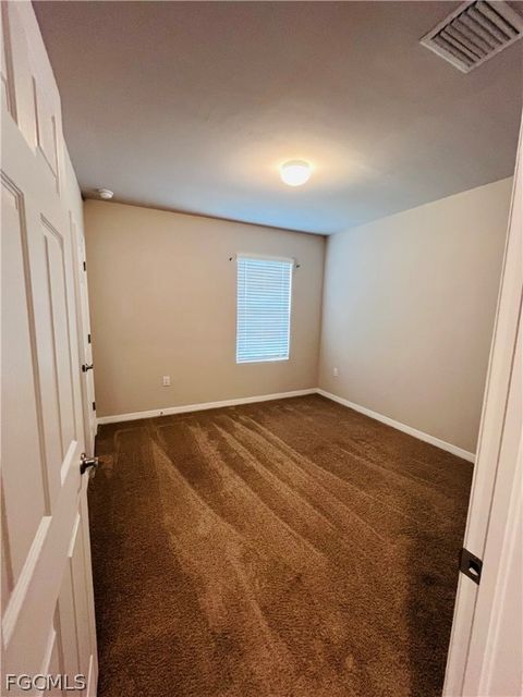 Tiny photo for 10601 Crossback Lane, Lehigh Acres, FL 33936 (MLS # 2026008381)