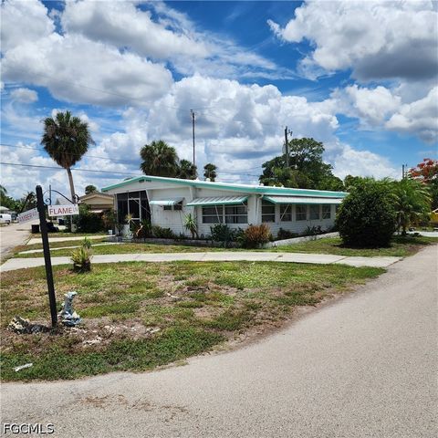 Photo of 136 Amber Avenue, North Fort Myers, FL 33917 (MLS # 2026022638)