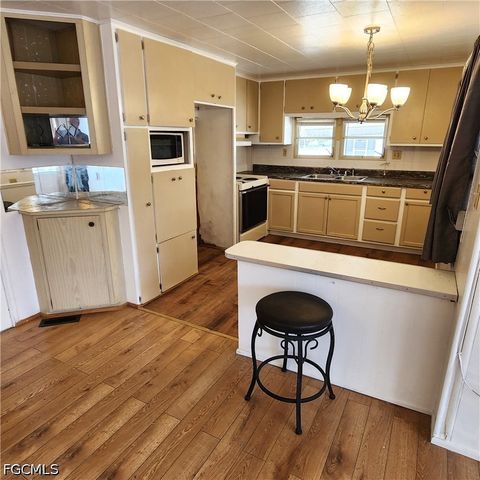 Tiny photo for 136 Amber Avenue, North Fort Myers, FL 33917 (MLS # 2026022638)