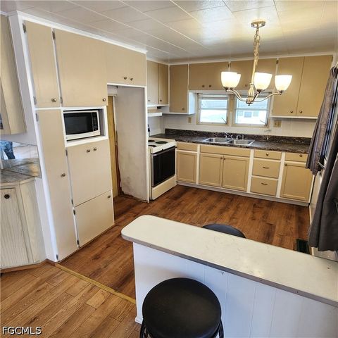Tiny photo for 136 Amber Avenue, North Fort Myers, FL 33917 (MLS # 2026022638)