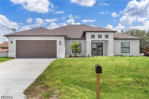 Photo of 3700 10TH Street W, Lehigh Acres, FL 33971 (MLS # 2026030996)