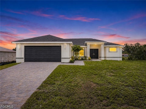Photo of 1718 NE 13th Place, Cape Coral, FL 33909 (MLS # 2026030297)